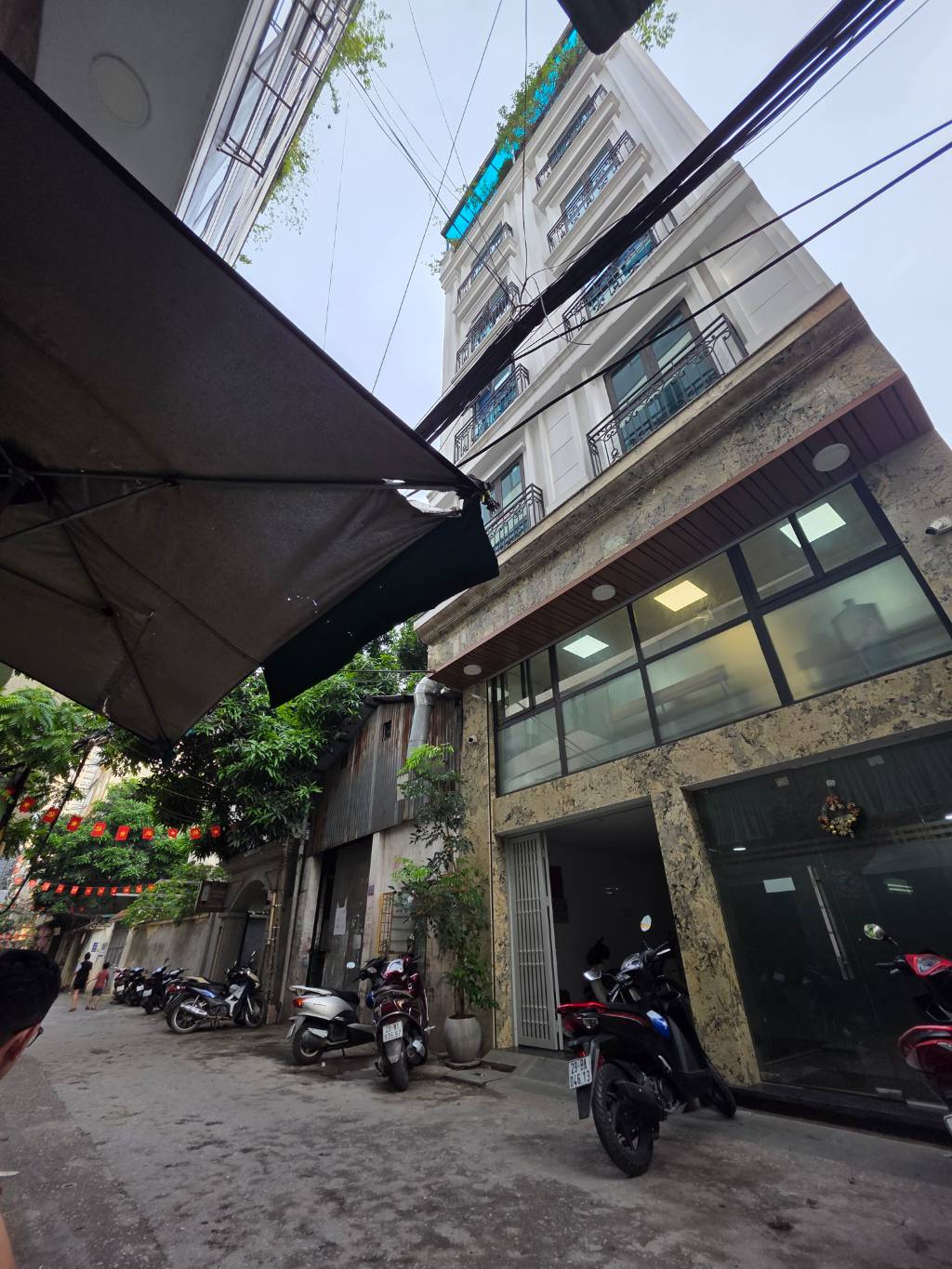 Bán nhà Vũ Ngọc Phan - diện tích 145m2 1 tầng - Ô TÔ TRÁNH - giá 52 tỷ