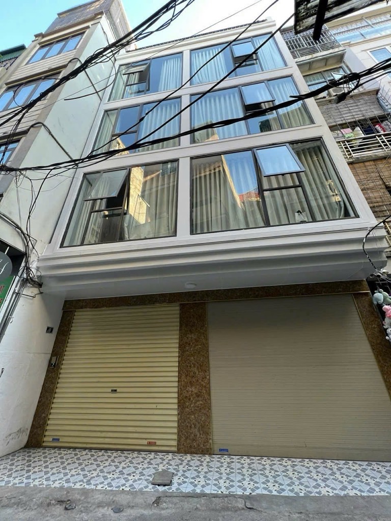 Bán nhà Lương Sử C - diện tích 92.4m2 6 tầng - Ô tô vào nhà - giá 33 tỷ